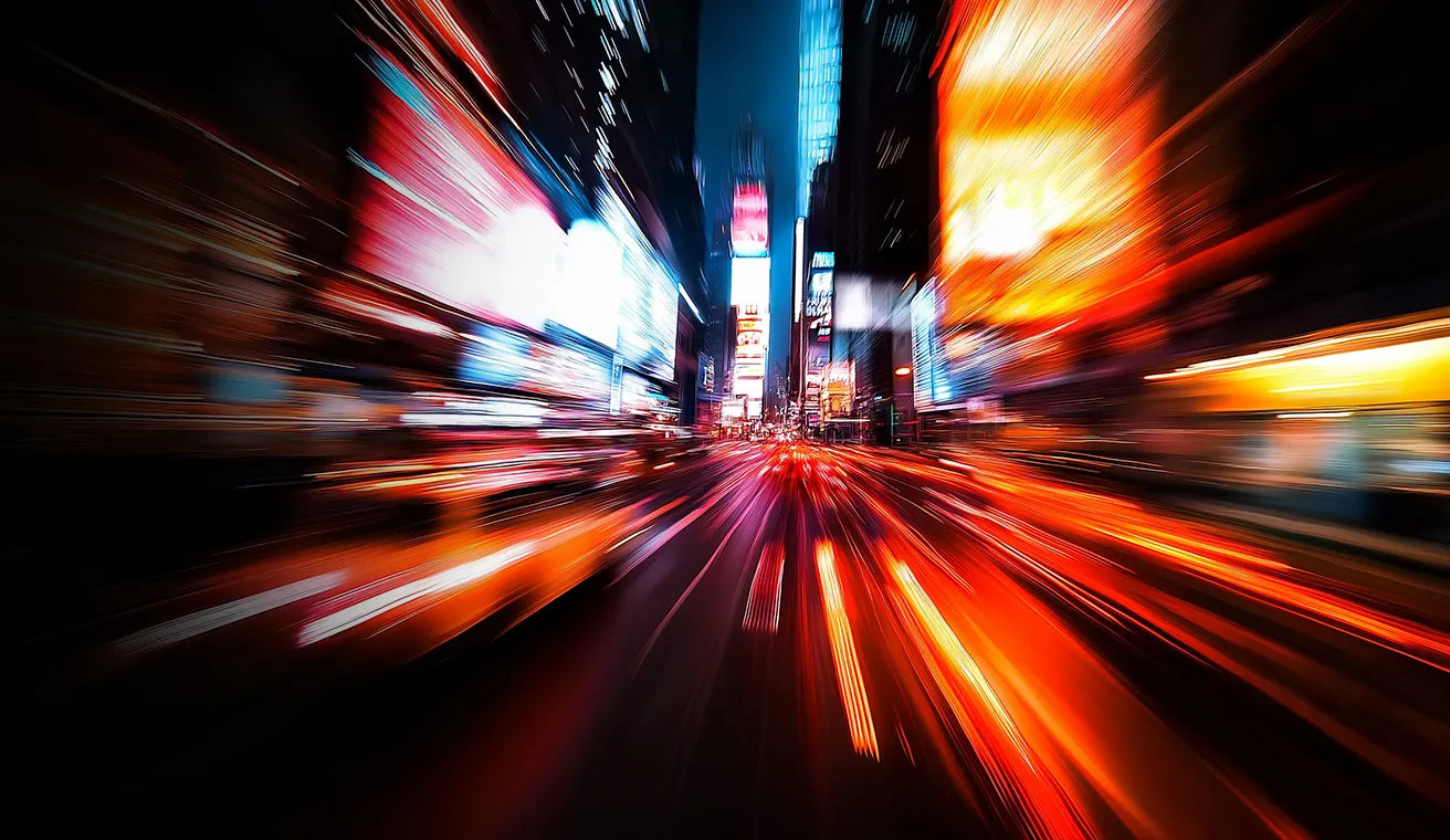 High-speed city lights background showcasing ZUTTO's smarter energy solutions. The banner highlights ZUTTO's expertise in optimizing energy efficiency for urban environments with advanced technologies. Perfect for sustainable energy management and reducing operational costs.